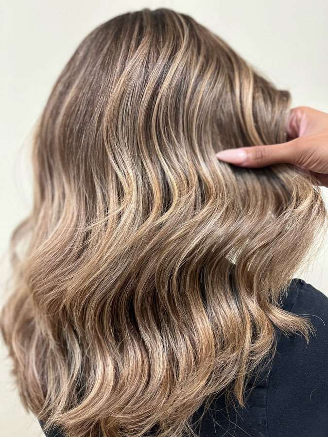 Woman with freshly styled blonde hair