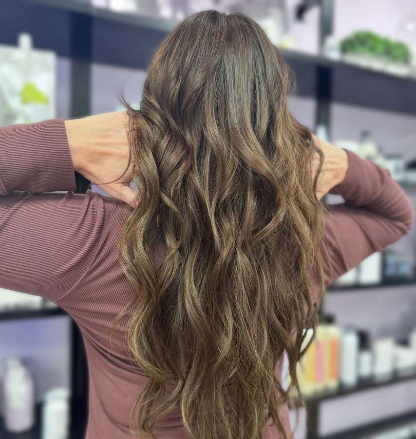 Client receiving a haircut transformation
