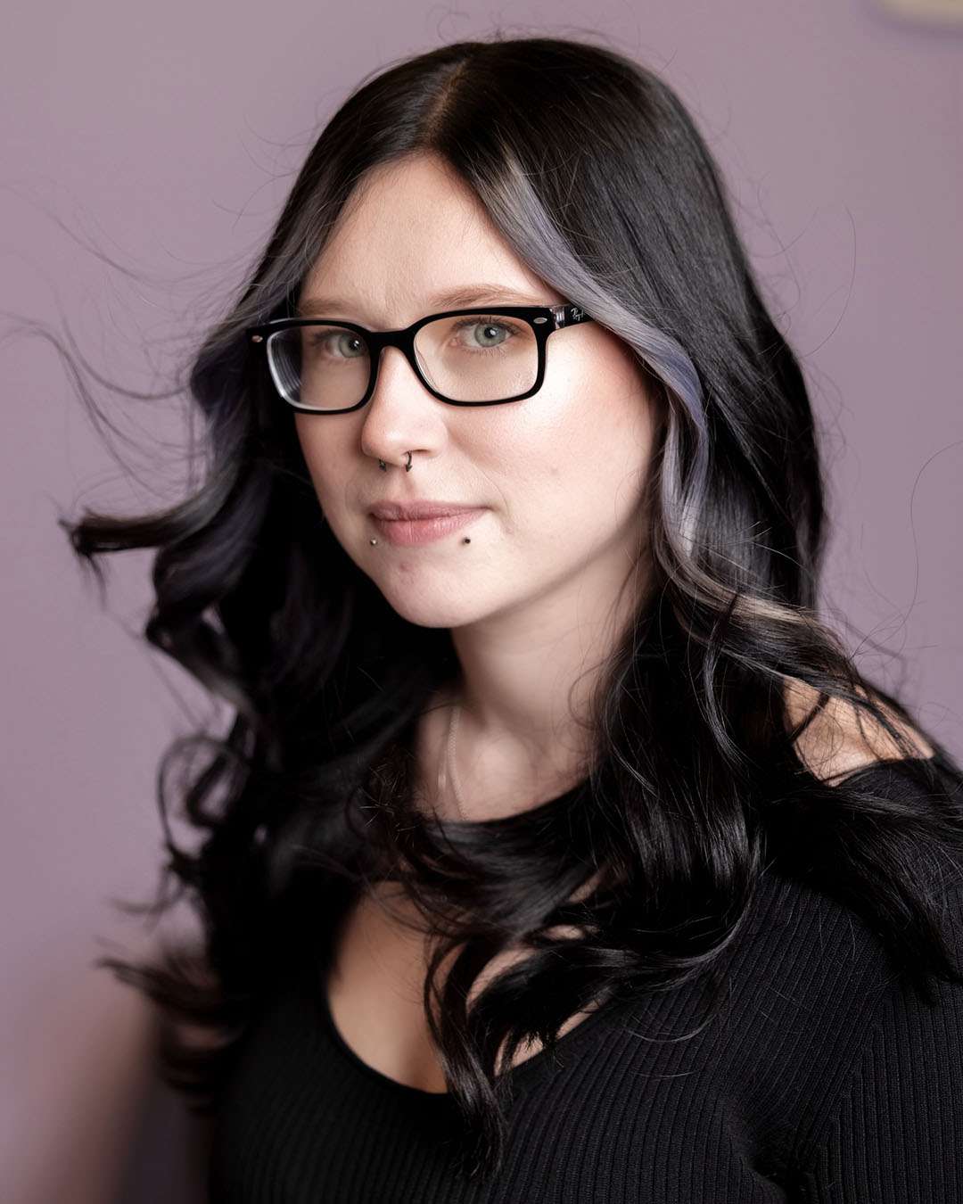 Vada, guest services team member at Salon 730
